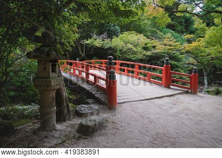 Typical Japanese Bridge Sourrounded By Autumn Maple Trees In Park On Mount Misen In Miyajima, Hirosh