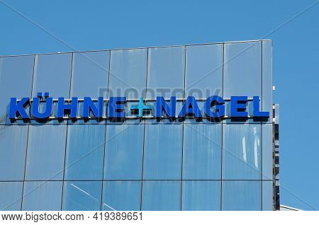 Schindellegi, Zurich, Switzerland - 28th March 2021 : Kuehne + Nagel Company Sign Hanging At The Hea