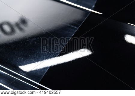 Before And After Effect After Car Varnish Polishing In Car Detailing Studio.