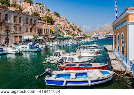Symi / Greece - August 17 2017: The Port Of Symi, A Tiny Island Of Dodecanese, That Amazes Visitors 