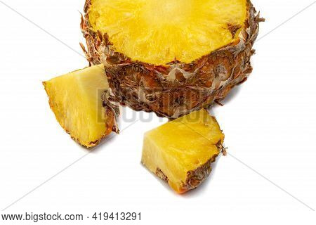 Tropical Fruit. Half Pineapple And Pineapple Slice Close-up On White Isolated Background. Healthy Fo