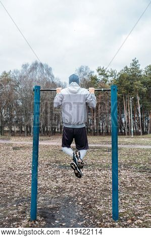 Outdoor Pull-up Bar And Parallel Bars Workout. Socially Distant Bootcamps. Group Fitness Workout Cla