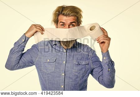 No Foul Smell Left Behind. Man Toilet Paper In Supermarket. Roll Of Toilet Paper. Panic Shopping Of 