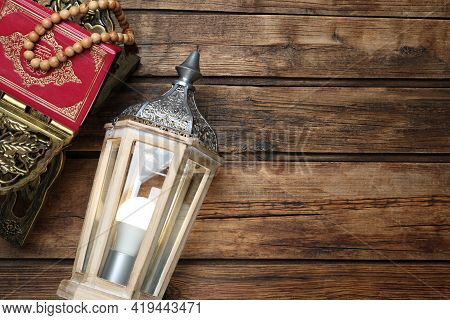 Arabic Lantern, Quran And Misbaha On Wooden Table, Flat Lay. Space For Text
