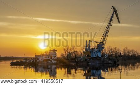 Dredger Is Working To Deepen The Fairway On The River. Cleaning And Deepening By A Dredger On The Ri