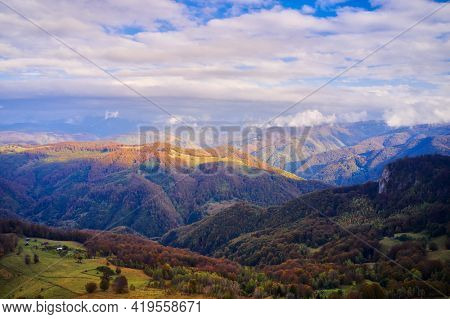 aerial view of Carpathian mountains countryside in autumn morning, Romania