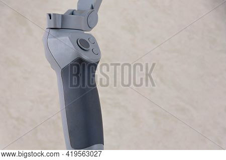 Image Stabilizer Gimbal For Modern Cell Phones. Instrument For Amateur Filming. Image And Video Stab