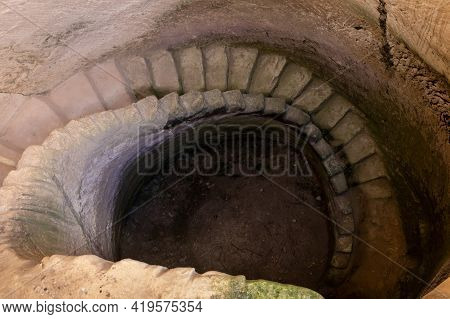 The Remains Of Stone Staircase Descends Into An Oil Press Tank On The Excavations Of The Ancient Mar