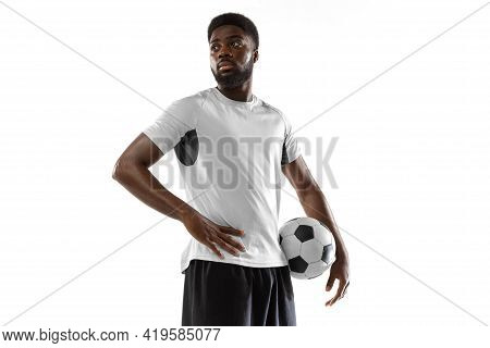 Close-up Young African Soccer Player Posing Isolated On White Background. Concept Of Sport.