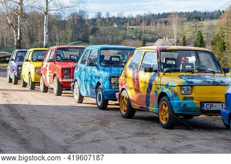 Madona, Latvia - May 01, 2021:  Row Of Colorful Stylish Vintage Fiat 126 Pancars Rental Cars, Pancar