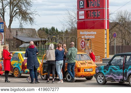 Gulbene, Latvia - May 02, 2021: More Colorful Vintage Cars Fiat 126 Gathered At The Gas Station, A F