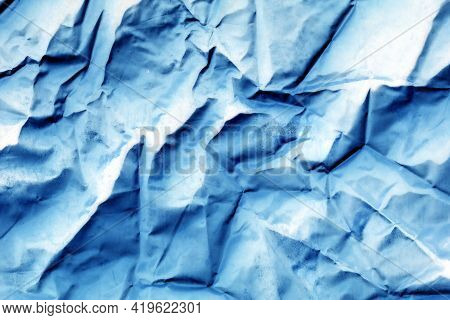 Abstract Background With Blue And White Crumpled Paper. Blue Crumpled Background.