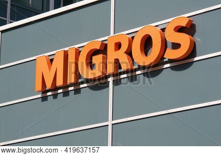 St. Gallen, Switzerland - 14th April 2021 : Migros Supermarket Logo Hanging On A Building In St. Gal