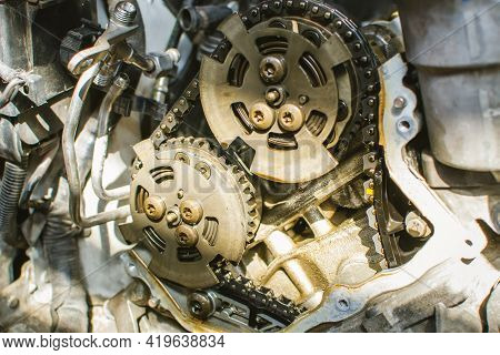 Car Timing Chain In Cutaway Engine. Vct