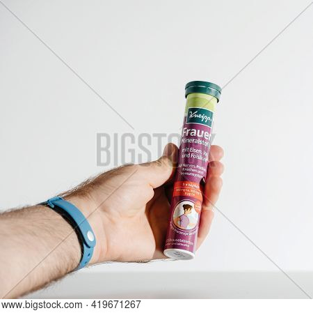 Paris, France - July 30, 2017: Pov Male Hand Holding Kneipp German Vitamins For Women Package On Tab