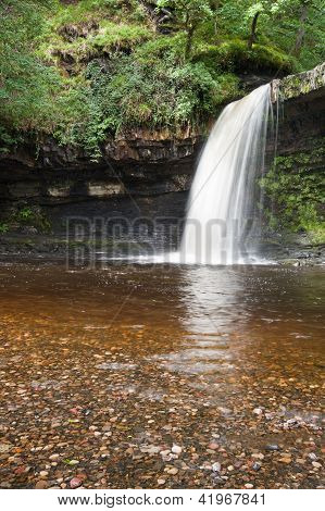 Beautiful Woodland Stream And Waterfall In Summer