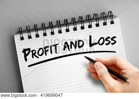 Profit And Loss Text On Notepad, Business Concept Background