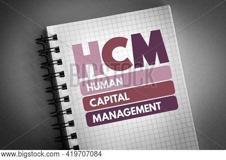 Hcm - Human Capital Management Acronym On Notepad, Business Concept Background