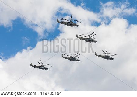 May 7, 2021, Moscow, Russia. An Aerobatic Group Of Ka-52 Alligator Army Helicopters Ipreparing L For