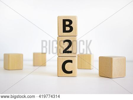 B2c - Business To Customer Symbol. Concept Word 'b2c - Business To Customer' On Cubes On A Beautiful