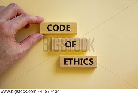Code Of Ethics Symbol. Wooden Blocks With Words 'code Of Ethics'. Beautiful White Background. Busine