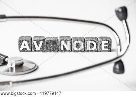 Stone Block Form Word Av Node With Stethoscope. White Background. Medical Concept. Atrioventricular 