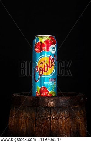Can Of Ursus Cooler Beer On Beer Barrel With Dark Background. Illustrative Editorial Photo Shot In B