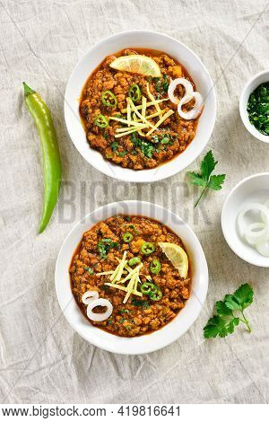 Keema Curry In Bowls Over Light Background. Indian And Pakistani Style Dish. Top View, Flat Lay