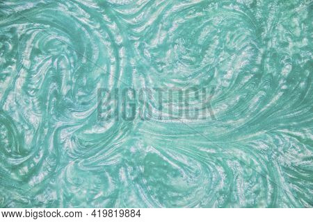 Liquid Turquoise Epoxy Resin Top View. Background
