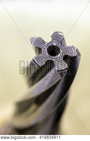 Electric Hammer Drill Bevel Gear Thread Close Up. Mechanism Detail Made Of Steel.