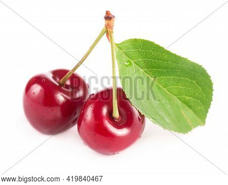 Ripe Fresh Red Cherry Isolated On White Background. With Clipping Path.