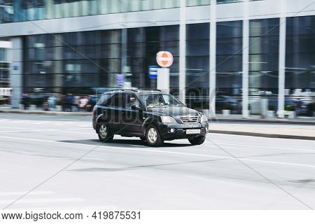 Kia Sorento First Generation Bl Rides On City Road. Overspeed In City Concept. Black Suv In Motion R
