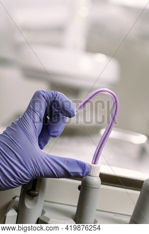 Dental Treatment, Healthcare And Dentistry Concept. The Womans Hand Shows The Heart Together With Th