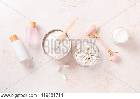 Different Types Of Collagen For Skin Care And Gua Sha Beauty Roller Flat Lay, Copy Space