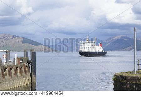 Ferry Ship Arriving At Scottish Island Of Rothersay