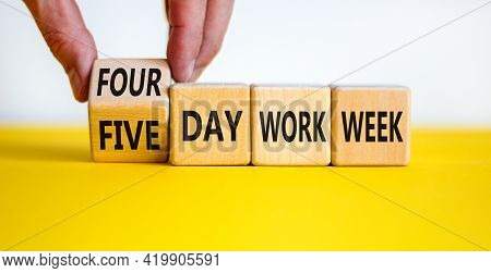 4 Or 5 Day Work Week Symbol. Businessman Turns The Cube, Changes Words 'five Day Work Week' To 'four