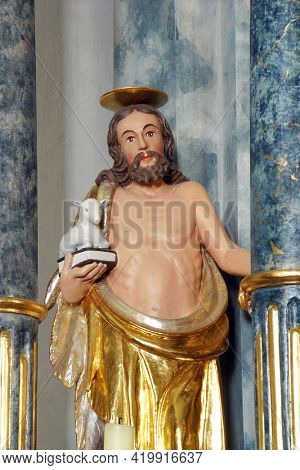 PLESIVICA, CROATIA - JULY 22, 2013: Saint John the Baptist statue on the Sacred Heart of Jesus altar at Saint George Parish Church in Plesivica, Croatia