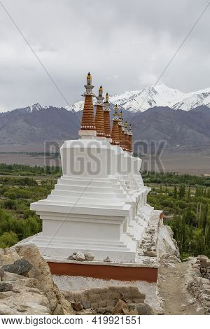 White Buddhist Stupa Or Pagoda In Tibetan Monastery Near Village Leh In Ladakh Region, Noth India