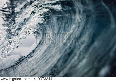 Barrel Wave With Bokeh In Pacific Ocean. Ideal Waves For Surfing
