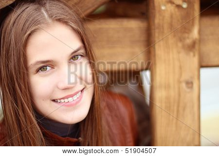 Portrait of a girl with a cross