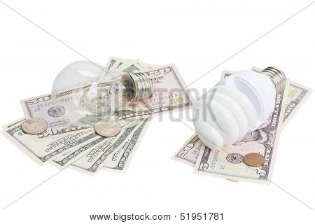 energy saving and normal   bulbs on dollars money