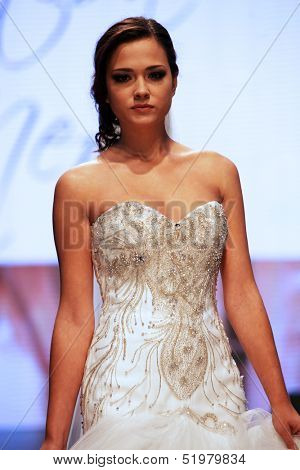 ZAGREB, CROATIA - OCTOBER 04: Fashion model wears dress made by Kontesa Nera on 'Wedding days' show, October 04, 2013 in Zagreb, Croatia.
