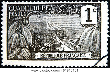 FRANCE - CIRCA 1917: A stamp printed in Guadeloupe shows Harbor at Basse-Terre circa 1917