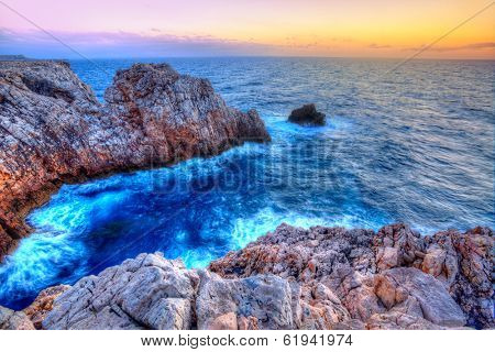 Menorca Punta Nati sunset in Ciutadella Balearic Islands at Mediterranean sea