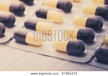 Black And Yellow Capsule