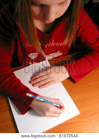 Young girl studying, homework