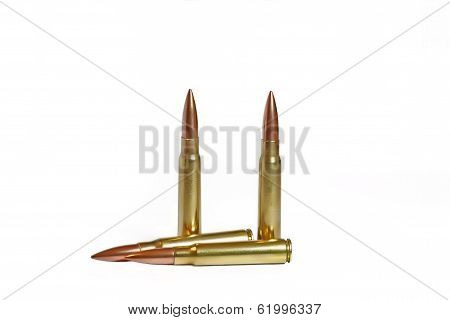 Four Bullets On A White Background
