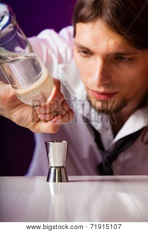 Young Man Bartender Preparing Alcohol Drink