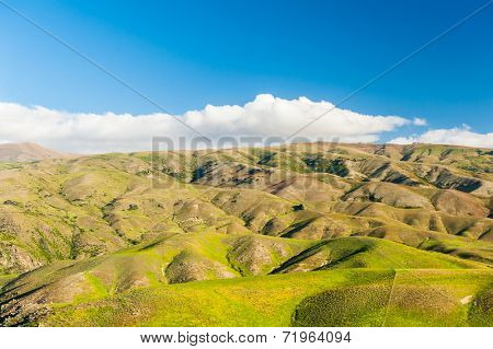 Beautiful green rolling hills of Southern New Zealand at dusk, Lindis Pass, Otago Region
