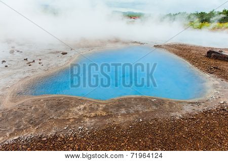 Blue pool Blesi at Haukadalur geothermal field, Iceland